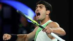 Carlos Alcaraz celebrates winning the Australian Open
