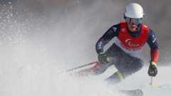 Neil Simpson skiing at the Beijing 2022 Paralympics