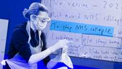 A nurse or medical practitioner wearing gloves and holding a Covid test. Behind her is a an extract of a handwritten document with words highlighted saying: "To stop NHS collapse".