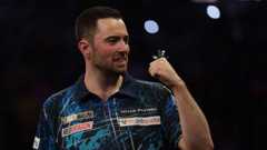 Luke Humphries celebrates