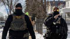 Masked US Immigration and Customs Enforcement (ICE) agents continue to conduct immigration enforcement operations in Minneapolis.