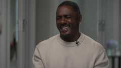 Sir Idris Elba laughing