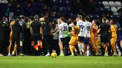 Players and coaches from Preston North End and Hull City come together