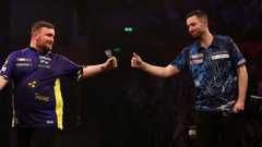 Luke Littler and Luke Humphries fist bump