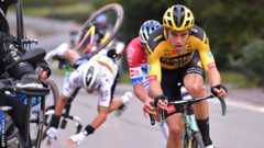 Julian Alaphilippe (back left) crashes behind Wout van Aert and Mathieu van der Poel