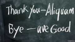 Latin for thank you and bye written on a blackboard