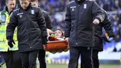 On-loan Birmingham City defender Tom Thorpe is stretchered off on his league debut at St Andrew's on Saturday