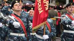 Troops of Georgia's rebel region of Abkhazia march during a military parade to mark the 20th anniversary of Abkhazia's de facto independence