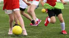 Children playing football