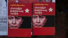 Booklets bearing Aung San Suu Kyi's face in Myanmar after her party swept to victory in November 2015's election