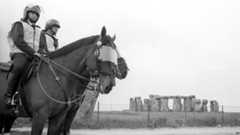 Mounted police on duty at deserted Stonehenge, where a four-mile exclusion zone was set up in June 1989.