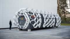 Let there be architecture for other planets Exterior shot of futuristic living pod designed using shipping container