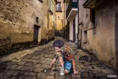 Street-Art-Boy-with-Marble-Italy.jpg