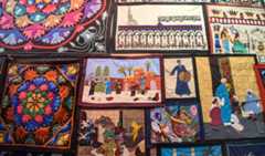 Vibrant and varied, <em>khayamiya</em> design motifs include geometric patterns, Egyptian history, and folklore.