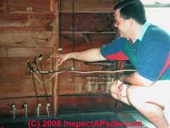 Knob and tube wiring with illegal extension (C) Daniel Friedman