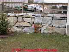 Unsafe retaining wall guardrail (C) Daniel Friedman