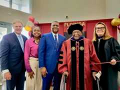 Matthew C. Russell receiving diploma from Dean O'Connor