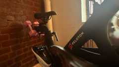 Peloton bike with weights and shoes accessories