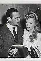 Joan Fontaine and William Goetz in Ivy (1947)