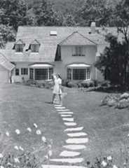 Image may contain Urban Neighborhood Building Human Person Housing Nature Yard Outdoors Vegetation and Plant