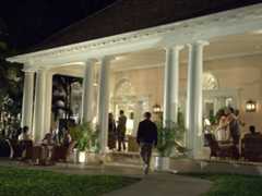 Image may contain Human Person Patio Building Furniture Chair Porch Architecture and Lighting