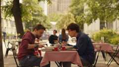 Image may contain Kieran Culkin Jesse Eisenberg Dating Person Romantic Cup Adult Chair Furniture and Car