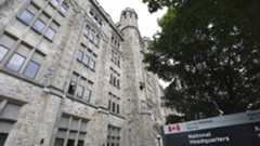 A building with a sign out front that reads "Canada Revenue Service"