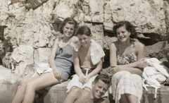 Image may contain Human Person People Clothing Apparel Female Face Family and Smile