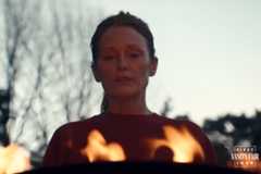Image may contain Julianne Moore Fire Flame Adult Person Bbq Cooking Food and Grilling