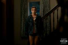 Image may contain Sydney Sweeney Clothing Coat Jacket Handrail Architecture Building House Housing and Staircase