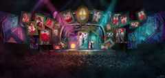 A vibrant stage show at Disney's Hollywood Studios features various characters in colorful costumes and dynamic poses against a backdrop of framed images. An audience watches the performance, reminiscent of a Disney Villains Show, under dramatic lighting.