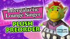 Green plush toy resembling Sonny Eclipse An intergalactic singer with a keyboard dress and colorful background. Text reads "Intergalactic Lounge Singer Plush Preorder" and "Carousel of Products.