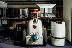 Image may contain Vehicle Car Transportation Automobile Sports Car Hat Clothing Apparel and Tire