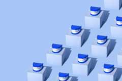 Blue chatter teeth toys on rows of blue pedestals