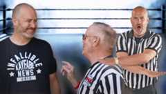 Kayfabe News creator Colin Hunter, seen here alongside noted WWE and TNA referee Earl Hebner, trades satire for stripes in the new documentary The Ref Didn’t See It! And reality hit him harder than expected.