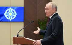 Лидер российского режима Владимир Путин в Киргизии.