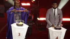 Senegalese coach and former football player Aliou Cisse (L) and Nigerian footballer Joseph Yobo stand at the draw of the CAF 2025 AFCON Africa Cup of Nations, in Rabat, on January 27, 2025.