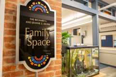 The Richard S. and Jeanne Z. Dunn Family Space at Seymour Library -- entrance with sign and fish tank