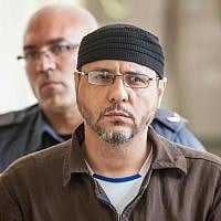 Abdullah Barghouti is taken to Jerusalem Magistrate's Court to testify as part of a US civil lawsuit against the Palestinian leadership, on June 20, 2012. (Noam Moskowitz/Flash90) Abdullah Barghouti is taken to Jerusalem Magistrate's Court to testify as part of a US civil lawsuit against the Palestinian leadership, on June 20, 2012. (Noam Moskowitz/Flash90)