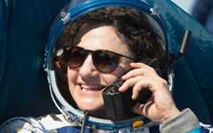 NASA astronaut Jessica Meir talks to her mother on a satellite phone outside the Soyuz MS-15 spacecraft after she lands with NASA astronaut Andrew Morgan and Roscosmos cosmonaut Oleg Skripochka in a remote area near the town of Zhezkazgan, Kazakhstan on Friday, April 17, 2020. (NASA/GCTC/Andrey Shelepin) NASA astronaut Jessica Meir talks to her mother on a satellite phone outside the Soyuz MS-15 spacecraft after she lands with NASA astronaut Andrew Morgan and Roscosmos cosmonaut Oleg Skripochka in a remote area near the town of Zhezkazgan, Kazakhstan on Friday, April 17, 2020. (NASA/GCTC/Andrey Shelepin)