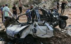 People inspect the wreckage of a vehicle targeted by an alleged Israeli strike in the southern Lebanese village of Harouf on October 25, 2025. (MAHMOUD ZAYYAT / AFP) People inspect the wreckage of a vehicle targeted by an alleged Israeli strike in the southern Lebanese village of Harouf on October 25, 2025. (MAHMOUD ZAYYAT / AFP)