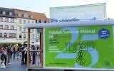 A sign advertises the Yiddish Summer Weimar festival on Weimar's market square, eastern Germany, on August 17, 2025. (Jastinder KHERA / AFP) A sign advertises the Yiddish Summer Weimar festival on Weimar's market square, eastern Germany, on August 17, 2025. (Jastinder KHERA / AFP)