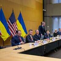 Senior US officials face the Ukrainian delegation during discussions on a US plan to end the war in Ukraine at the US Mission in Geneva, on November 23, 2025. (Fabrice COFFRINI / AFP) Senior US officials face the Ukrainian delegation during discussions on a US plan to end the war in Ukraine at the US Mission in Geneva, on November 23, 2025. (Fabrice COFFRINI / AFP)
