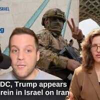 A member of the Revolutionary Guard flashes a victory sign while taking position as a man holds an Iranian flag under the Azadi, or freedom, monument tower during an annual rally marking 1979 Islamic Revolution at the Azadi square in Tehran, Iran, February 11, 2026. (AP Photo/Vahid Salemi) A member of the Revolutionary Guard flashes a victory sign while taking position as a man holds an Iranian flag under the Azadi, or freedom, monument tower during an annual rally marking 1979 Islamic Revolution at the Azadi square in Tehran, Iran, February 11, 2026. (AP Photo/Vahid Salemi)