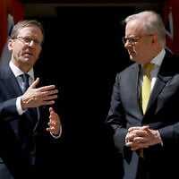 Australia's Prime Minister Anthony Albanese (R) receives President Isaac Herzog at the Parliament House in Canberra on February 11, 2026. (Photo by DAVID GRAY / AFP) Australia's Prime Minister Anthony Albanese (R) receives President Isaac Herzog at the Parliament House in Canberra on February 11, 2026. (Photo by DAVID GRAY / AFP)