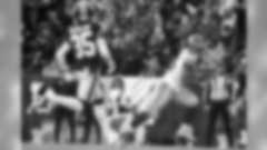 New York Giants running back Saquon Barkley, right, looks at Washington Redskins free safety Montae Nicholson (35) while scoring on a touchdown pass from quarterback Daniel Jones during the first half of an NFL football game, Sunday, Dec. 22, 2019, in Landover, Md. (AP Photo/Alex Brandon)