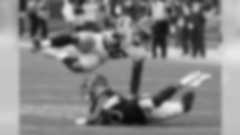 New York Giants running back Saquon Barkley (26) flips over Chicago Bears cornerback Kyle Fuller (23) during the second half of an NFL football game in Chicago, Sunday, Nov. 24, 2019. (AP Photo/Charles Rex Arbogast)