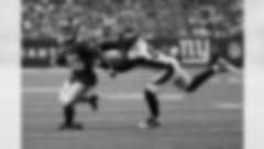 New York Giants running back Saquon Barkley (26) runs to avoid a tackle from Denver Broncos outside linebacker Von Miller (58) during an NFL football game, Sunday, Sept. 12, 2021, in East Rutherford, N.J. The Denver Broncos won 27-13. (AP Photo/Steve Luciano)