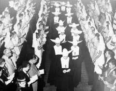 A black and white photograph of the Sisters in Procession