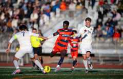 Ondieki Maina ’26 puts a shot on in Sunday’s showdown vs. Eau Claire.Photo courtesy of Mac Athletics.